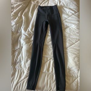 black lululemon like new leggings. brand new. never worn. size 0.